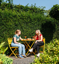 Load image into Gallery viewer, MaximaVida foldable metal round garden table Max 70 cm ochre yellow
